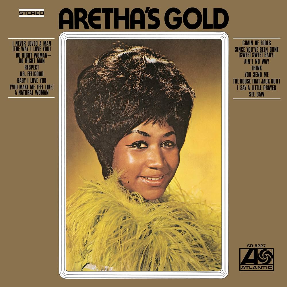 The album cover of Aretha's Gold by Atlantic Records, featuring a portrait of Aretha with a yellow feathered collar against a warm brown background.