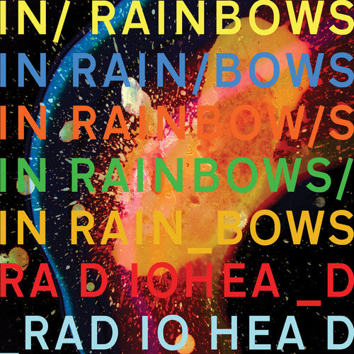 The image shows the cover of the Radiohead album 'In Rainbows' with a colorful abstract design and the band's name in a repeating pattern.