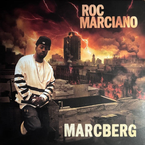 Album cover with a person sitting on a rooftop, cityscape with smoke and fire in the background, and 'Roc Marciano' and 'Marcberg' text.