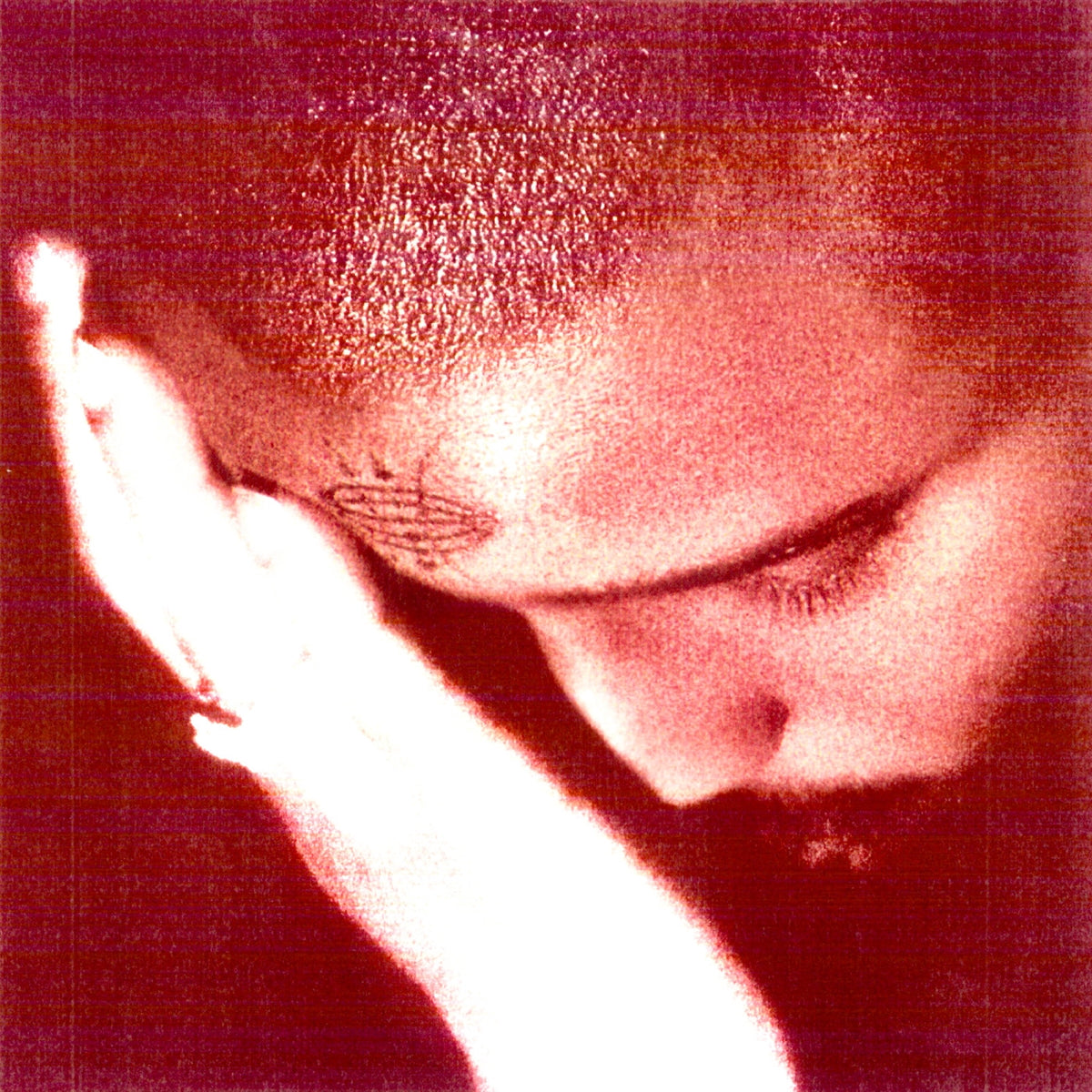 Close-up of a person's face with a blurred background