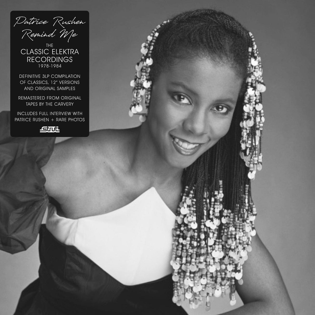 The cover image shows the artist, Patrice Rushen, with a smile on her face, wearing a white and black outfit, and a necklace of beaded flowers. The album title 'Remind Me: Classic Elektra Recordings' is at the top, and the text 'Definitive 3-CD Compilation' and 'Includes Fallen Angel, Haven't We Met, and More' is a description of the content.