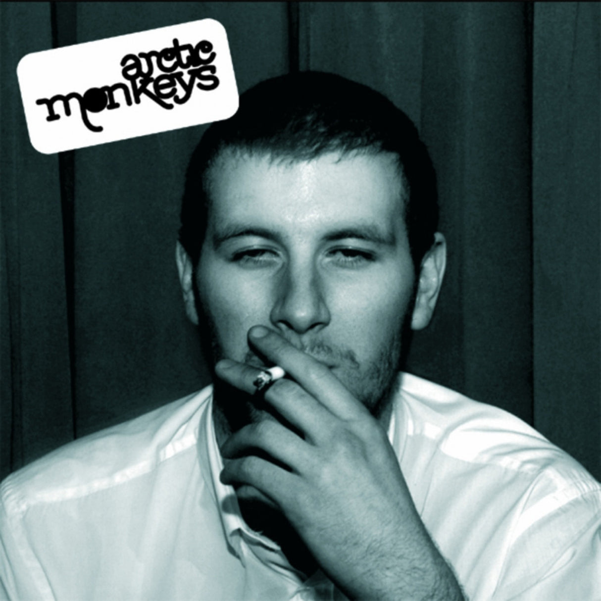 Album cover with a person smoking, featuring the Arctic Monkeys logo.