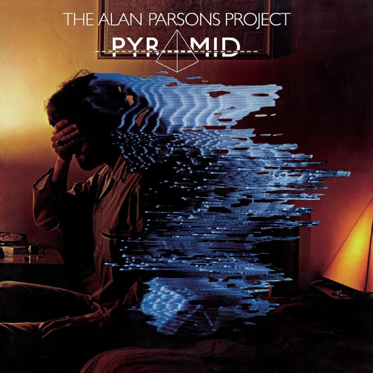 Album cover for 'Pyramid' by The Alan Parsons Project featuring a person with their head in their hands.