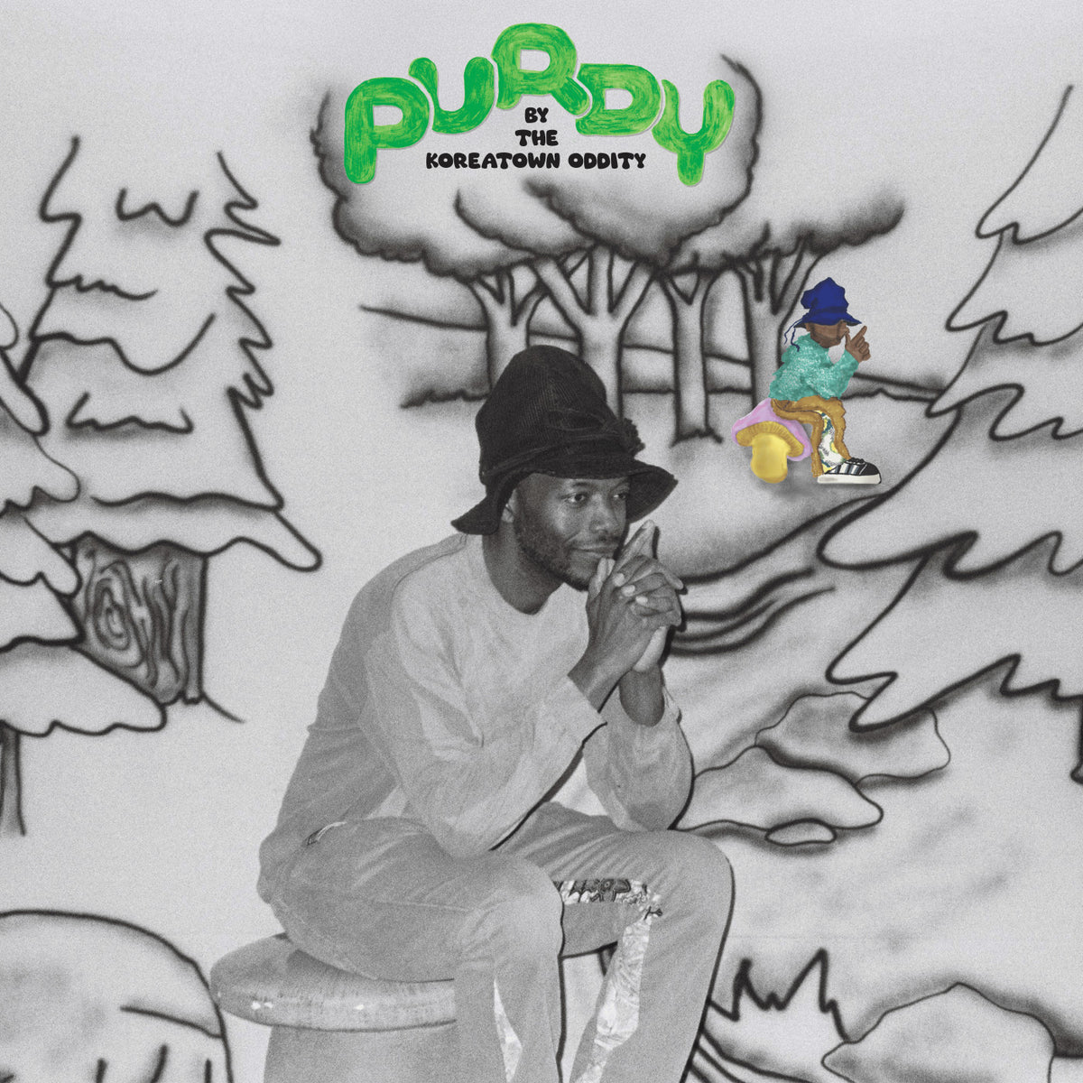 Album cover art for 'PUBBY' by The Koreatown Oddity, featuring a black and white illustration of a man in a bucket hat sitting on a stool, with a small colorful figure in a blue hat in the background near the album title.