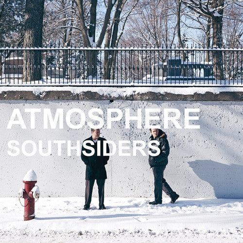 Two people standing in the snow with a fire hydrant and text overlay on a winter scene.