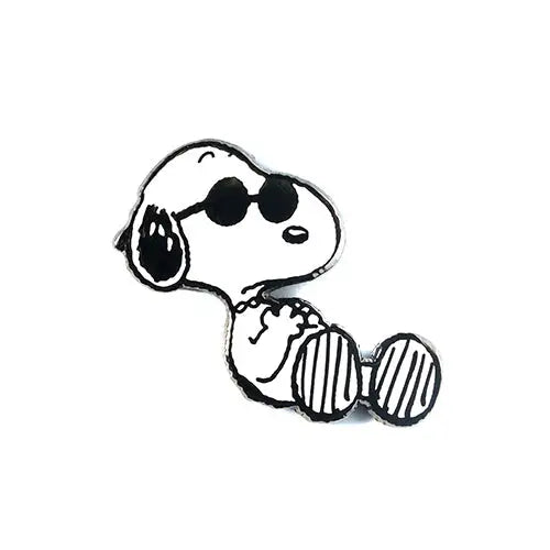A black nickel-plated brass pin with a hard enamel depiction of Snoopy from Peanuts wearing sunglasses.