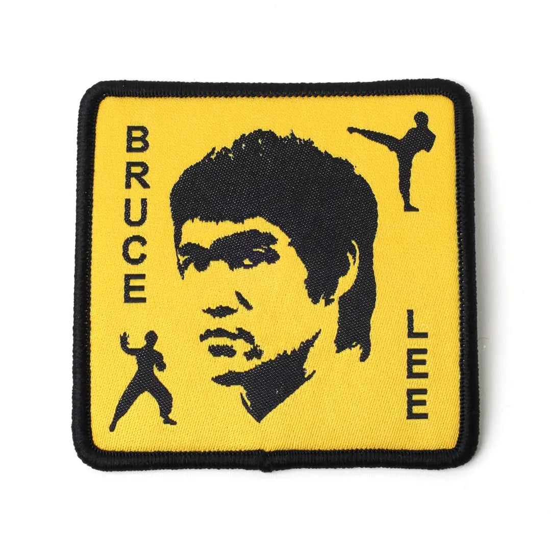 Patch with Bruce Lee's face and silhouette on a yellow background