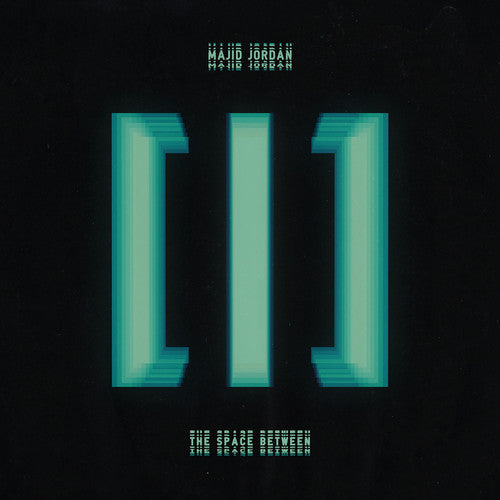 Vinyl record album packaging for Majid Jordan's album 'The Space Between' featuring a minimalist design with blue text on a black background.