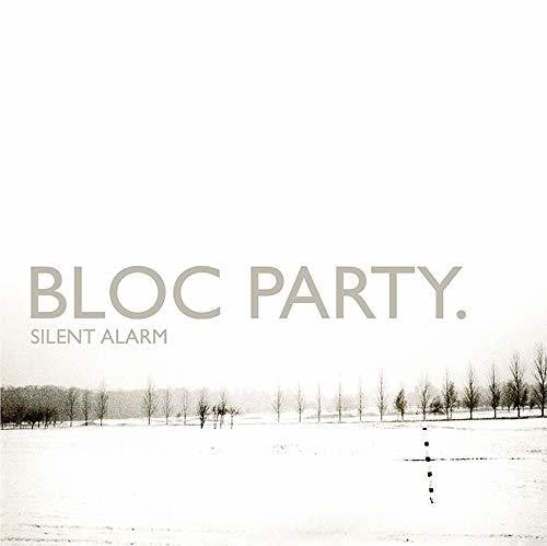 Album cover for 'Silent Alarm' by Bloc Party with a snowy landscape and bare trees.