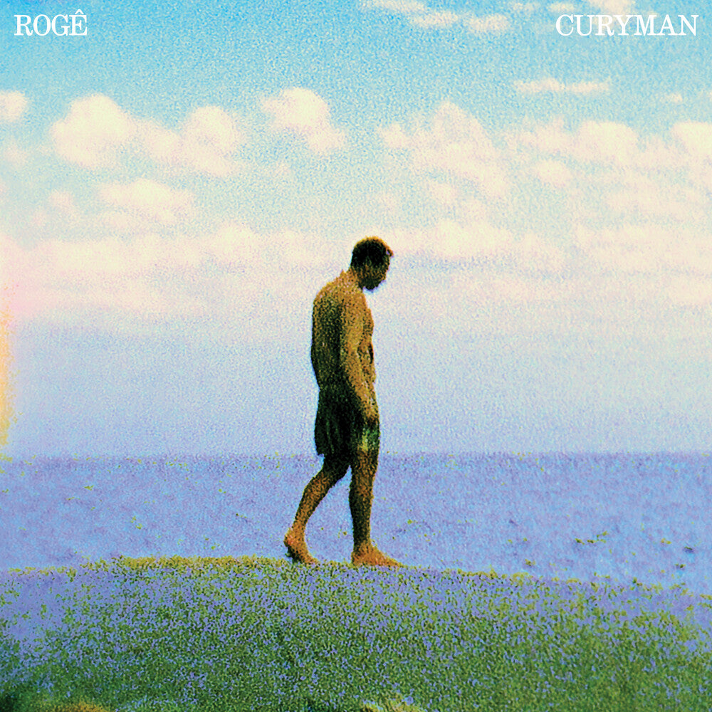 Album cover with a person walking on a grassy field under a blue sky, featuring the text 'ROGé CURYMAN'.
