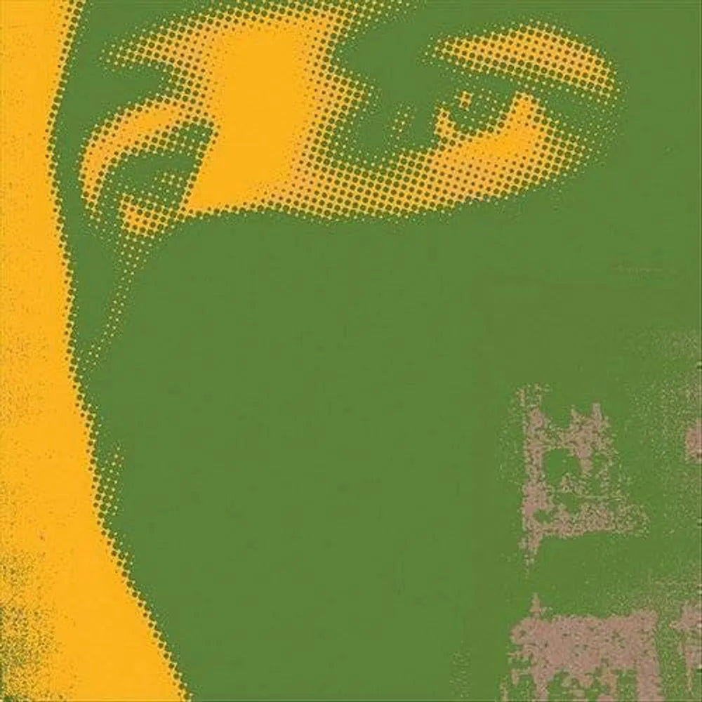 A stylized pop-art graphic print featuring a halftone face in yellow and green, with a textured abstract pattern in the lower right.