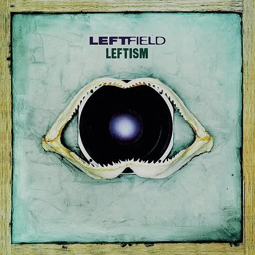 This image features the album cover for "Leftfield - Leftism 2LP." The cover art is striking with its original and visually compelling design.