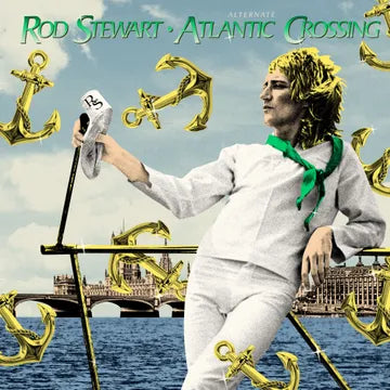 Album cover with a person in a white outfit holding a cane, surrounded by gold anchors and a bridge in the background.