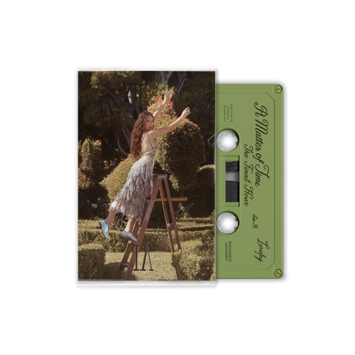 Cassette tape with a cover featuring a woman on a ladder in a garden setting