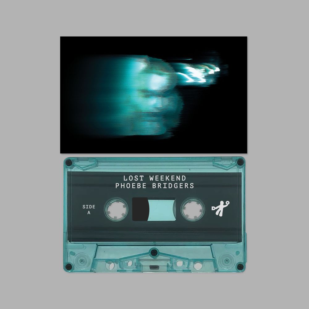 Cassette tape with 'Lost Weekend' by Phoebe Bridgers on a gray background