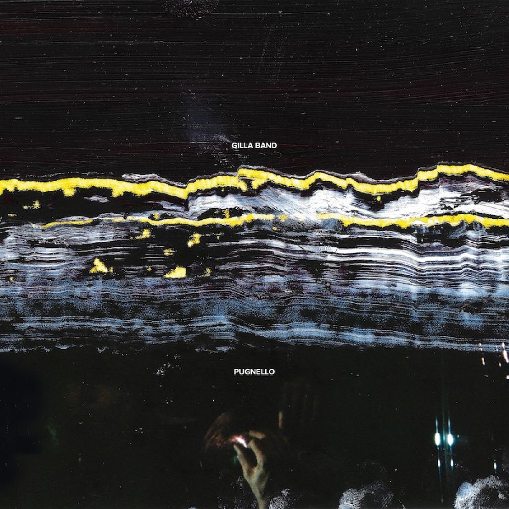 Album cover art for Gilla Band's 'Pugnello' featuring an abstract, textured black background with horizontal bands of yellow, white, and gray, and a small, indistinct figure near the bottom.