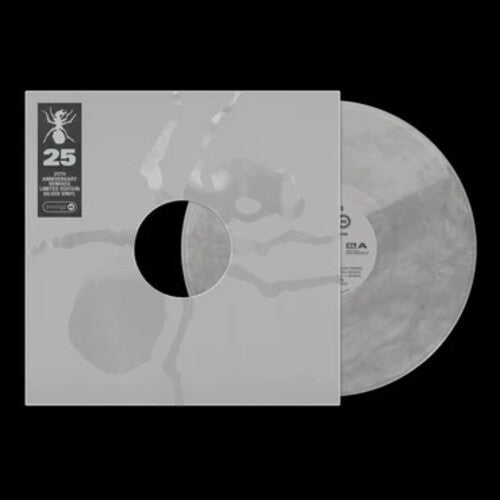 Vinyl record with a clear label and a black and white design on a black background