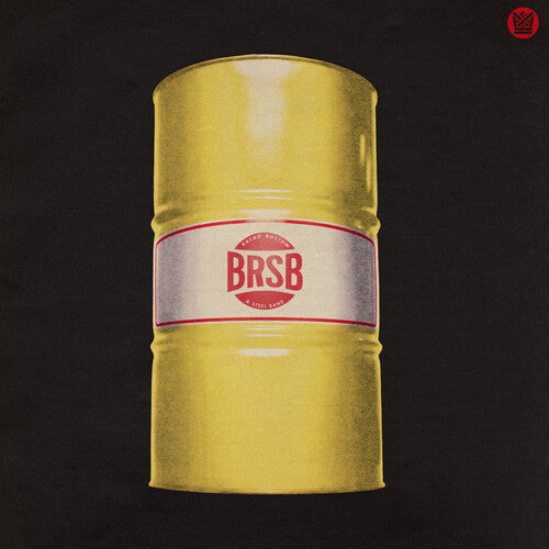 Limited edition yellow vinyl record of Bacao Rhythm & Steel Band - BRSB LP with a label that has the band's name and the title 'In The Crosshairs'.