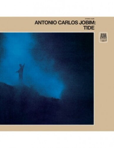 Antonio Carlos Jobim - Tide LP record cover with a blue background and an image of a person standing in the foreground.