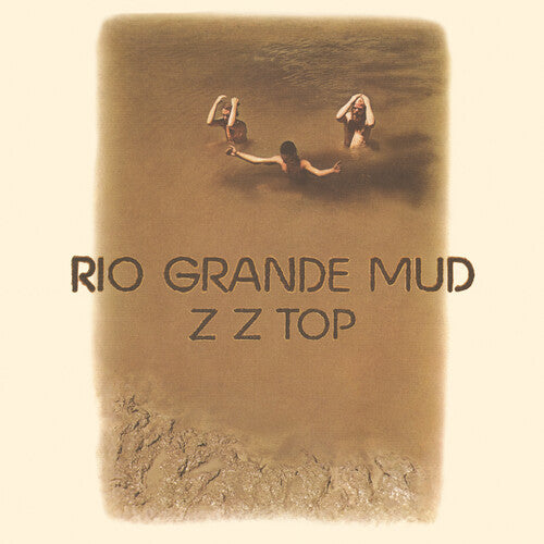 Album cover for ZZ Top's 'Rio Grande Mud' featuring a sepia-tone photo of three individuals relaxing in water with the album title and band name prominently displayed.