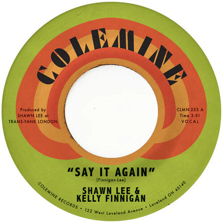 Vinyl record label with 'Say It Again' by Shawn Lee & Kelly Finnigan on a green and orange background.