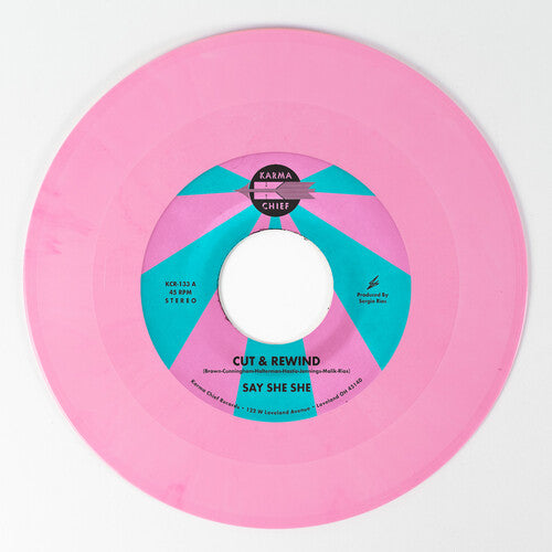 Pink vinyl record with a blue label on a white background