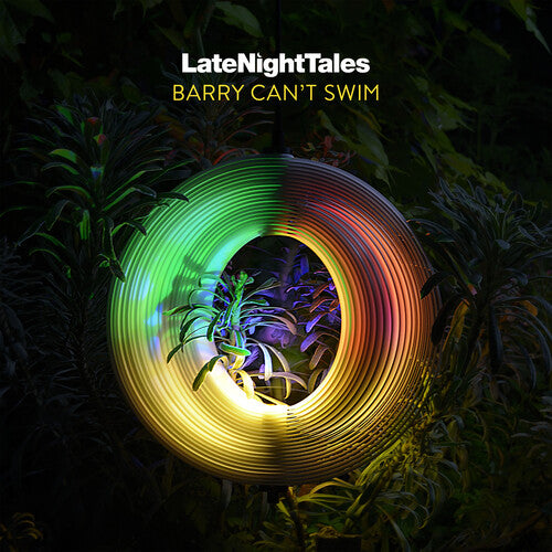 Album cover for 'LateNightTales' featuring a coiled cable with multicolor lighting on a dark background.