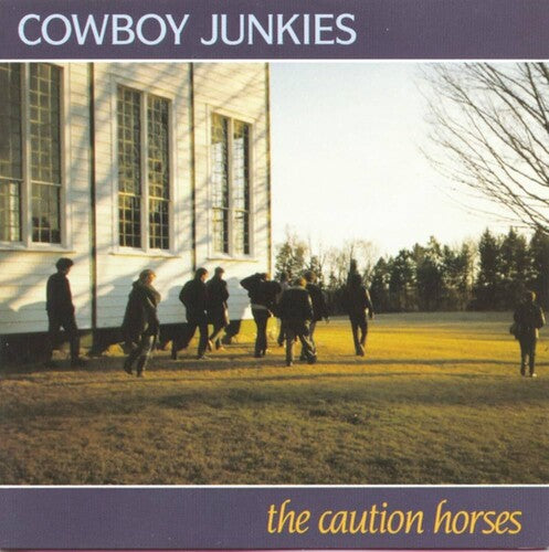 Album cover with people walking on grass near a building, featuring the text 'Cowboy Junkies' and 'The Caution Horses'.