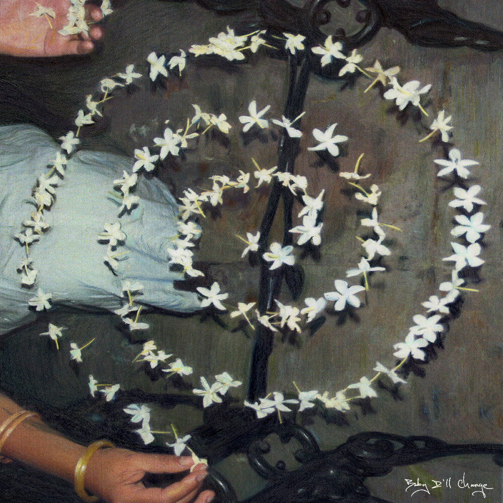 Decorative wreath of white flowers on a dark background