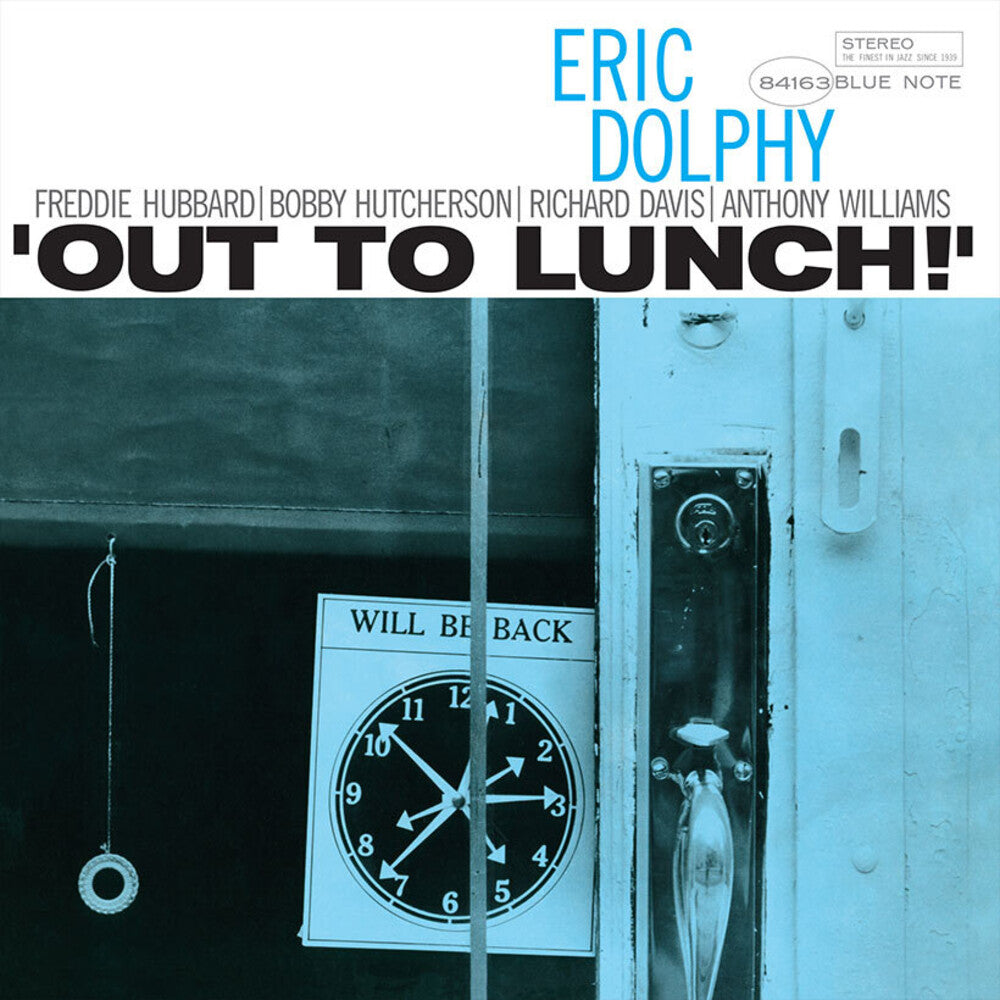 Album cover for Eric Dolphy's 'Out to Lunch!' on Blue Note, featuring a stylized blue-toned photograph of a door, clock, and window with bold black and blue text at the top.
