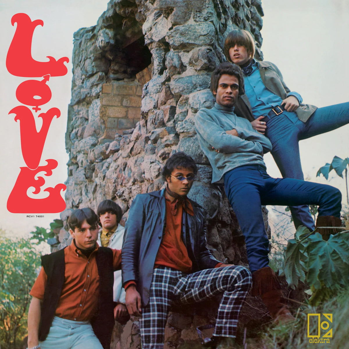 Album cover for 'LOVE' by The Byrds, featuring four band members posing in front of a stone tower. The left side has a large red 'LOVE' title, and the bottom right shows the yellow 'Byrds' logo.