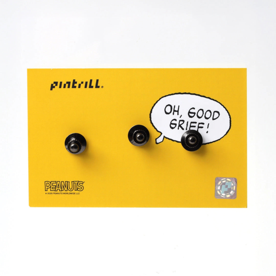 Pair of earrings with 'Oh, Good Grief!' speech bubble on a yellow background with Pintrill branding.