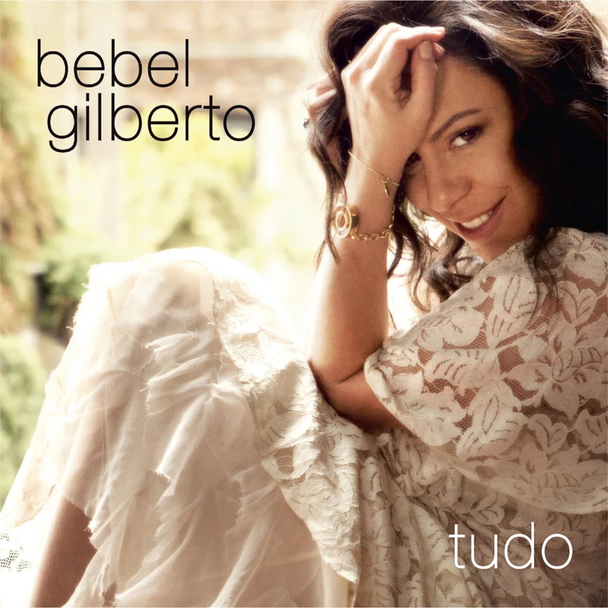 Album cover with a woman in a floral dress and 'bебел гилберто' text