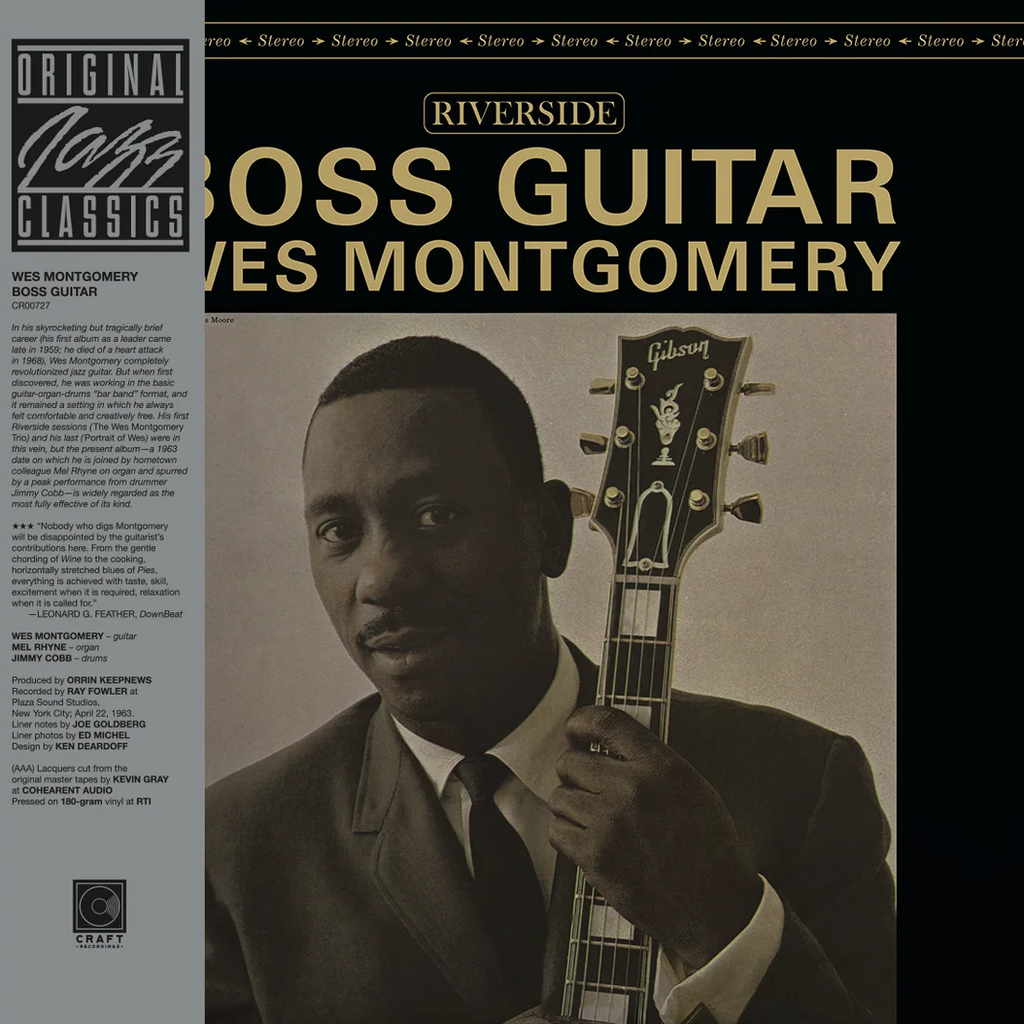 Album cover featuring a man holding a guitar with text about 'Boss Guitar' by Wes Montgomery.