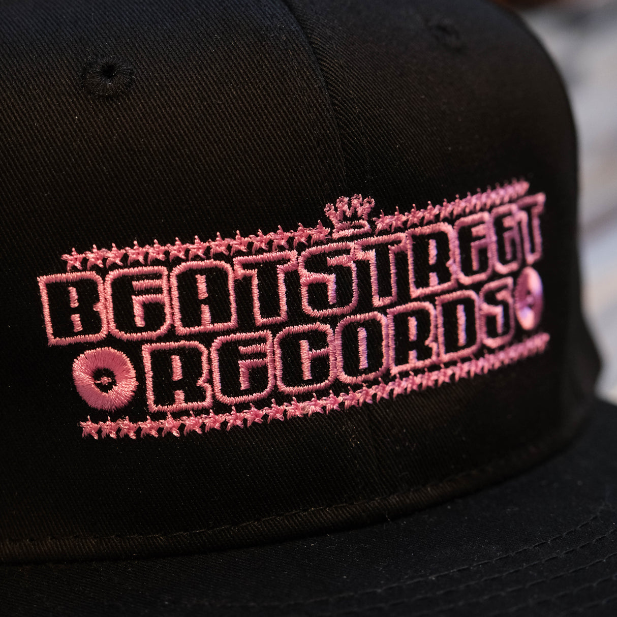 Beat Street Snapback Hat - Black with Pink Logo