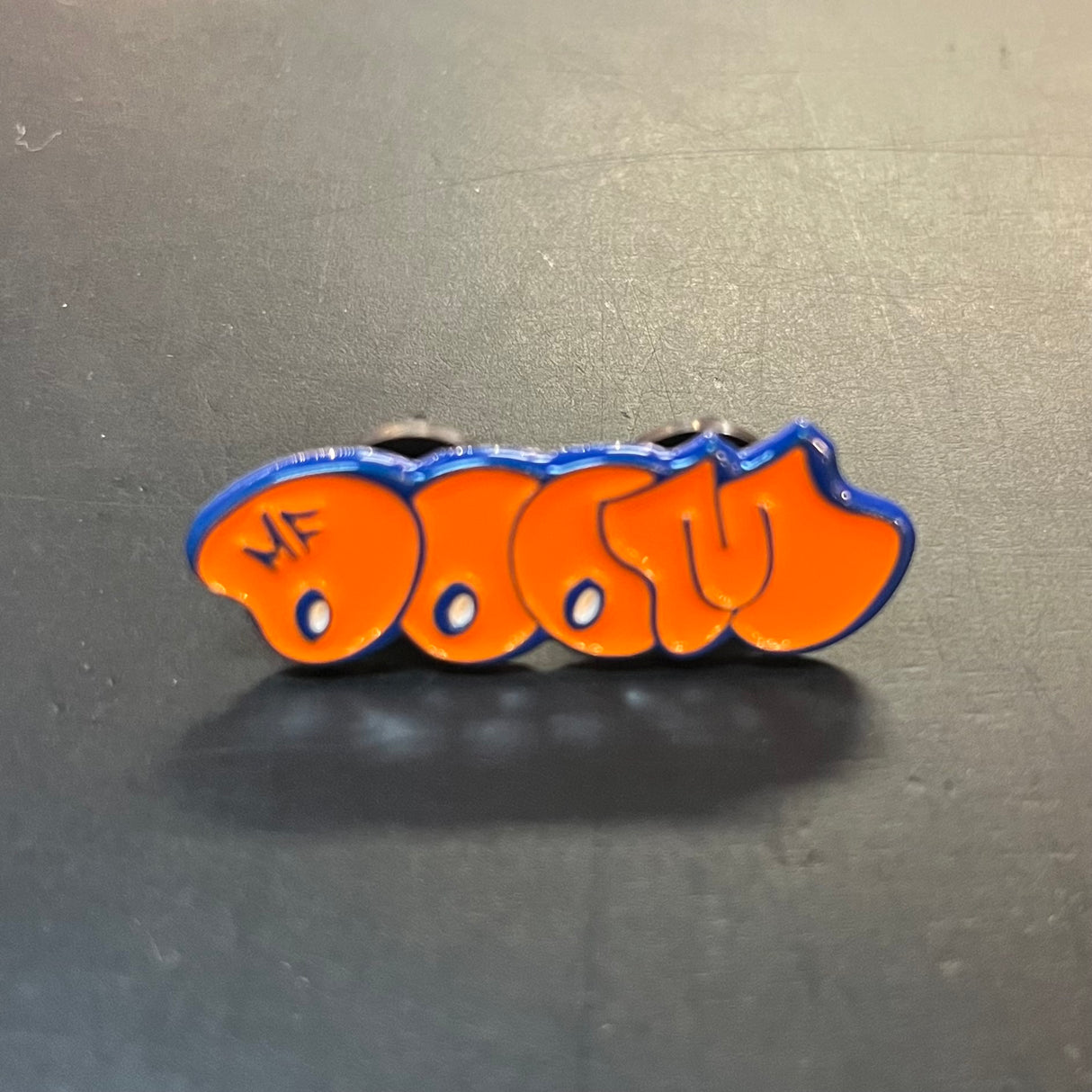 MF Doom Orange And Blue Pin