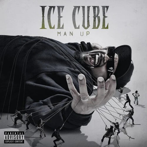 Album cover for 'Man Up' by Ice Cube with a person in a hooded outfit and small figures in the background.