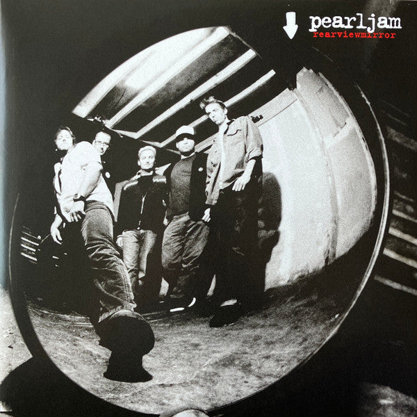 Black and white photo of Pearl Jam members with the band's name 'pearl jam' and album name 'Rearviewmirror' on the image.