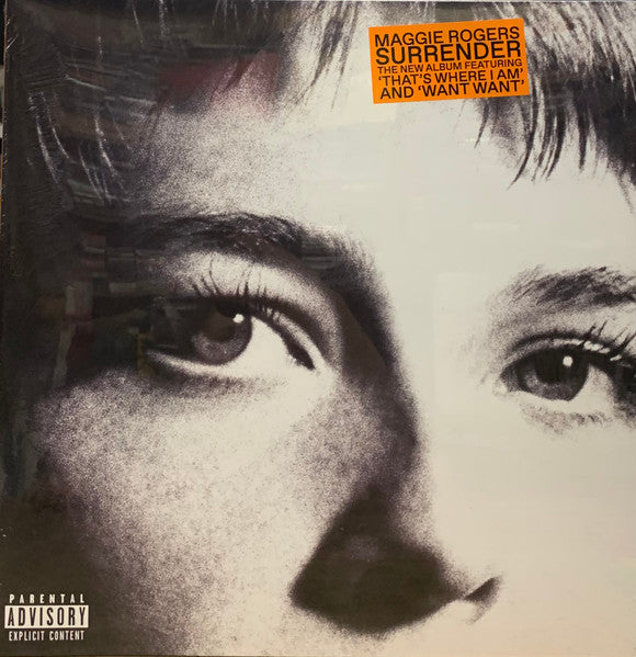 This image features the album cover of "Maggie Rogers - Surrender LP." The cover art is striking, showcasing a close-up photograph of Maggie Rogers's intense and captivating eyes, filling the frame.