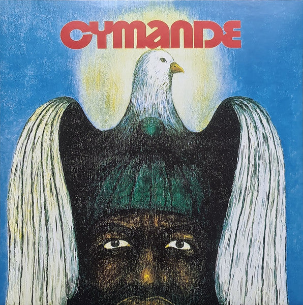 Album cover art for Cymande featuring a stylized graphic of a bird perched atop a human-like figure with wings, against a blue background.