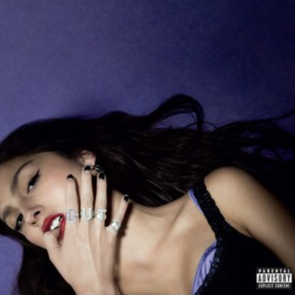 This image features the album cover for Olivia Rodrigo's second studio album, "GUTS LP." The cover art captures a striking and emotional portrait of Olivia Rodrigo.