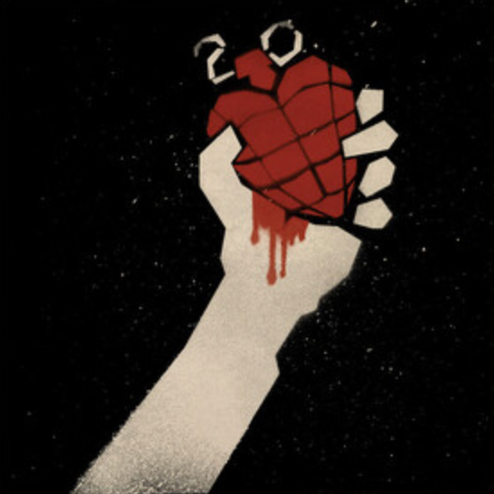 A graphic design featuring a hand holding a red heart with a splash of red, suggesting a thematic element related to the album's title and artwork.