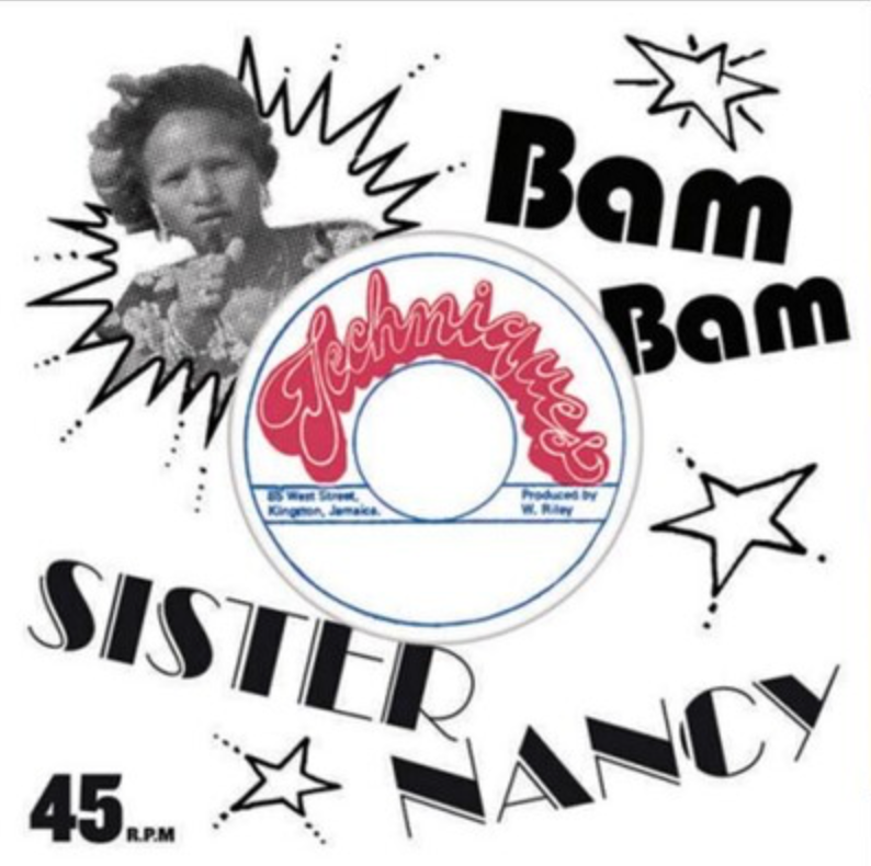 Record cover for 'Bam Bam' by Sister Nancy featuring a graphic of a woman's face and the text 'BAM BAM', 'JOHN MICHAELS', 'PRODUCED BY JERRY RINGS', and '45 RPM'. The background is black with star and explosion graphics.