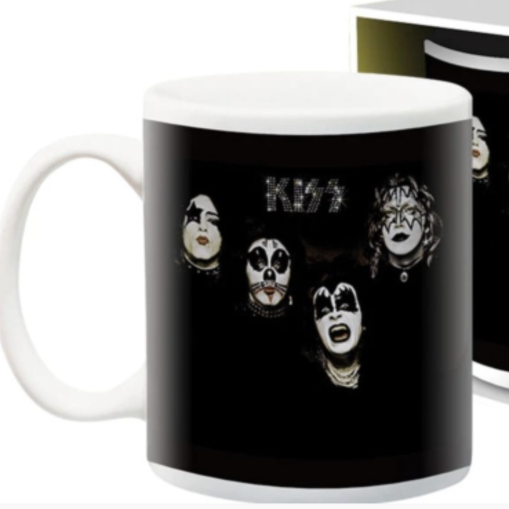 A mug with a black and white design featuring the members of the Kiss album.