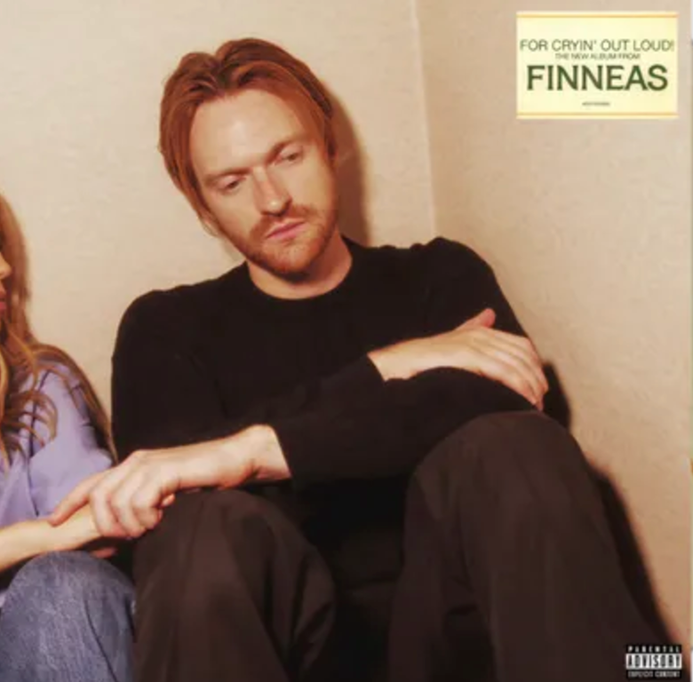 The image features the album cover for "For Cryin' Out Loud!" by Finneas. The cover depicts a poignant scene with Finneas and a female vocalist, both sitting close by a wall, looking off to the distance.