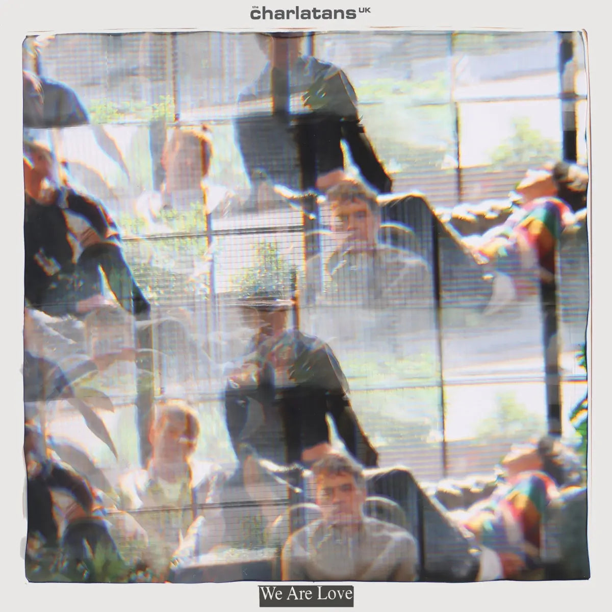 A square album cover for 'We Are Love' by charlatans uk, featuring a heavily textured, grainy, and layered photographic collage of people in a bright indoor setting.