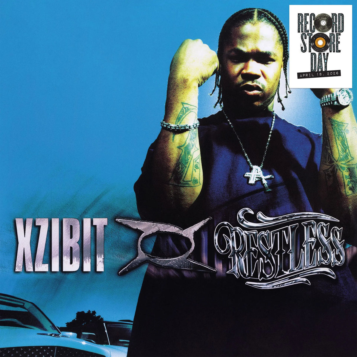 Album cover featuring a person with tattoos and text 'XZIBIT RESTLESS' on a blue background.