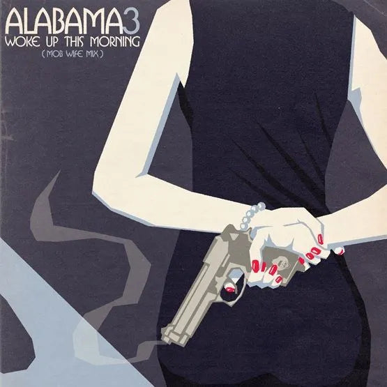 Album cover with a person holding a gun and handcuffs, titled 'Alabama3 Woke Up This Morning'.