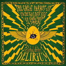 Decorative design with a central eye and text on a green and yellow background