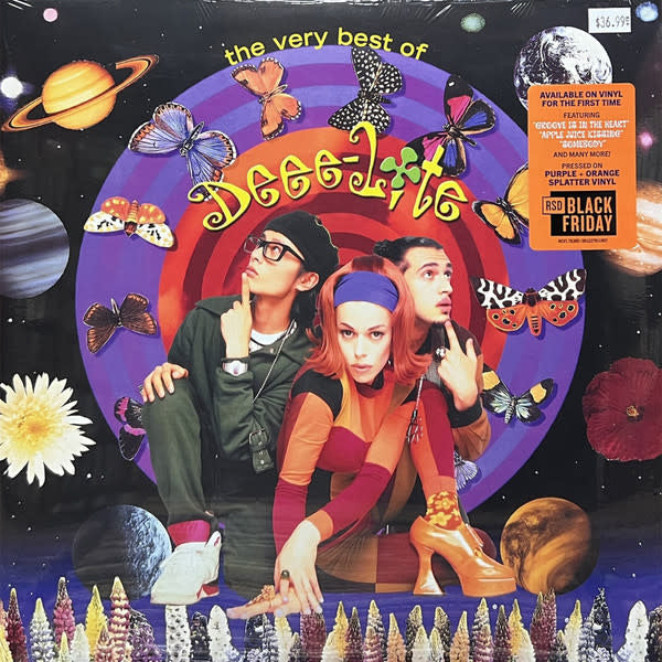 Vinyl record cover for 'The Very Best of Deee-Lite' with colorful design and text.